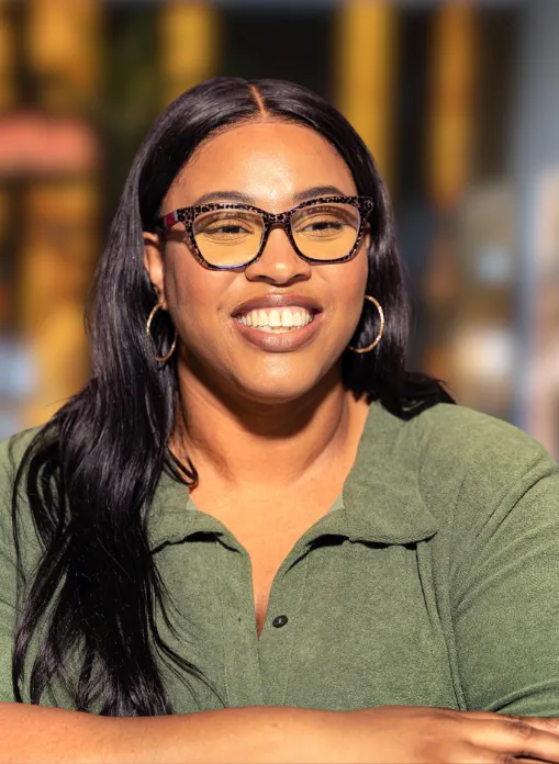 Jazmin Steir, Executive Assistant/ Admin Saliva Direct Inc. wearing glasses and a green button up top